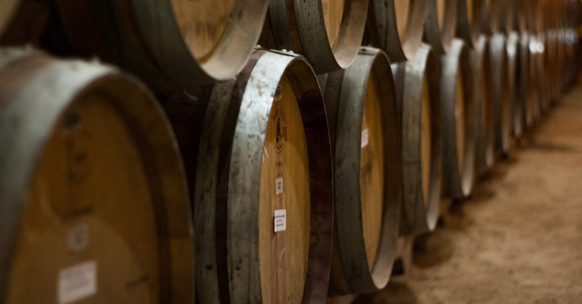 long stack of wine barrels